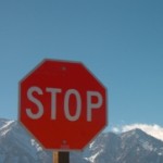 1337950_snow_capped_sierra_mountain_stop_sign